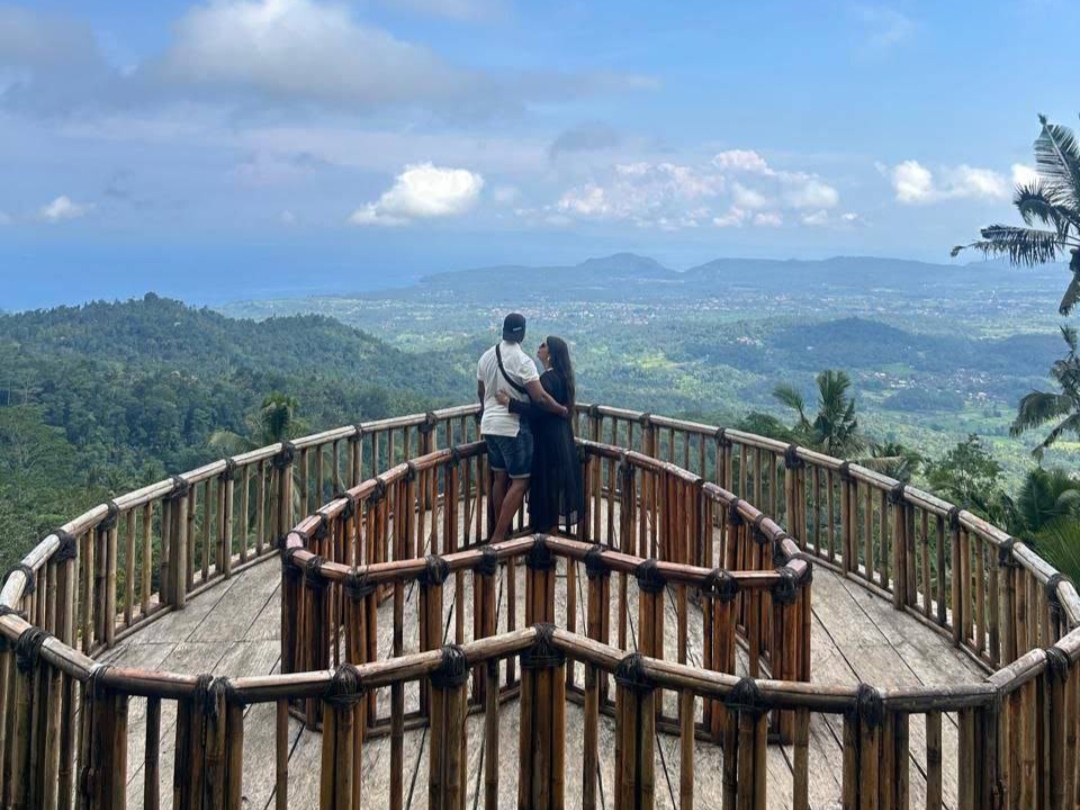 Couple under umbrella in Bali